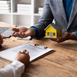 mortgage-and-real-estate-property-investment-concept-real-estate-agent-explain-terms-and-condition